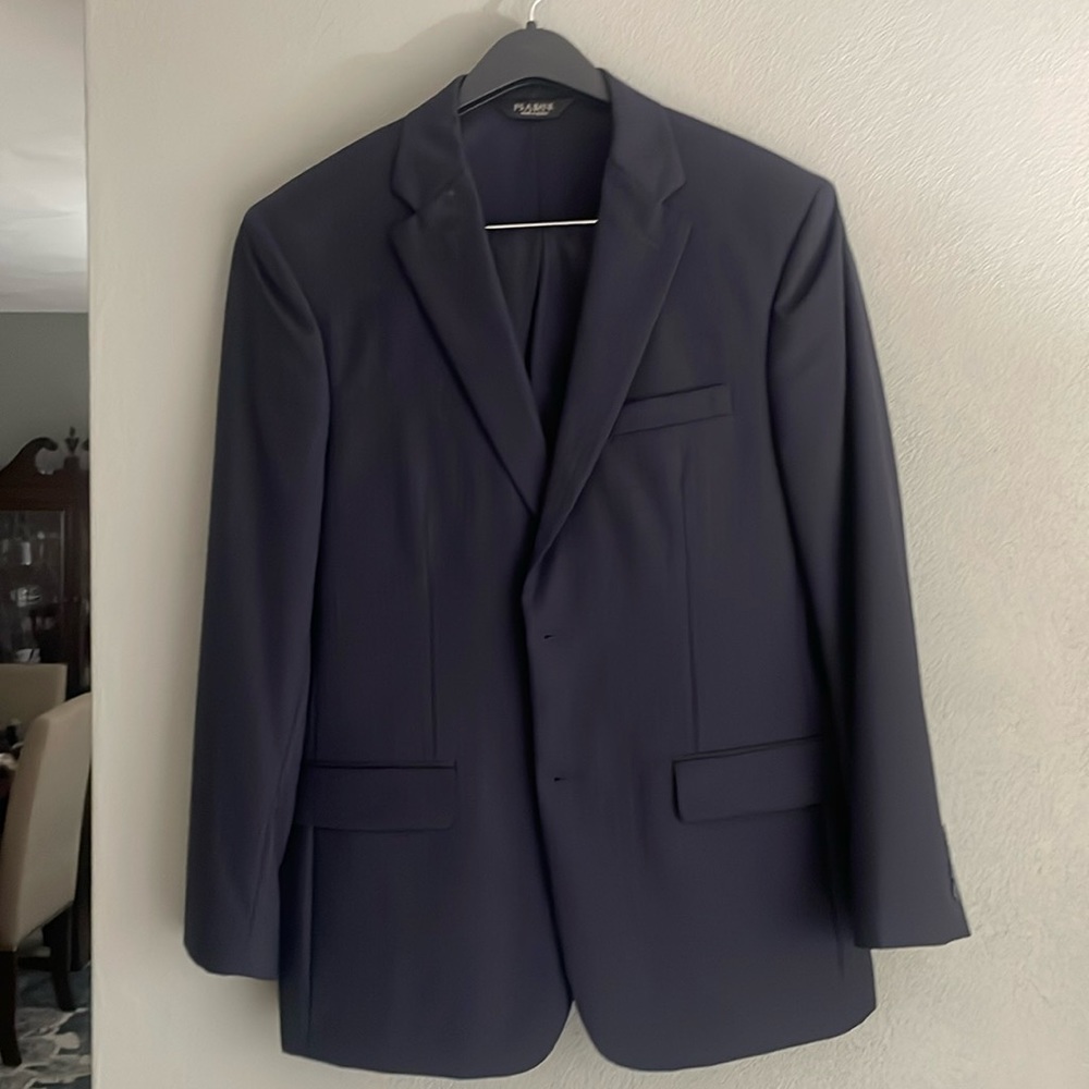 Joesph A Banks Navy pinstripe suit. Jacket 42R. Pants 34-35 waist, 30/31 inseam
